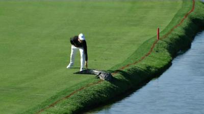 Cody Gribble and an alligator