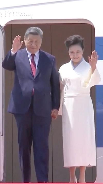 Xi Jinping and his wife arriving in Pyongyang for state visit to North Korea.