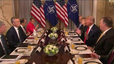 President Trump sits around table with Nato officials