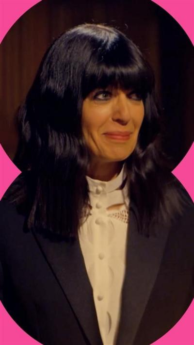 The Traitors presenter Claudia Winkleman wearing white blouse and black blazer