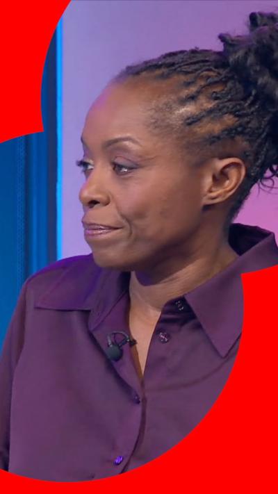 Dr Lade Smith CBE in a purple shirt