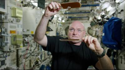 Scott Kelly plays ping pong in space