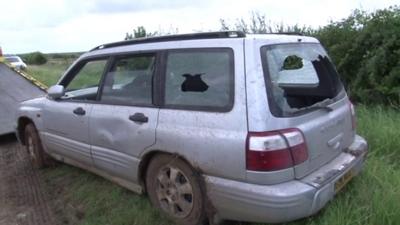 Car with smashed windows