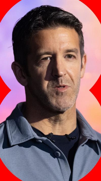 John Ternus wears a blue shirt