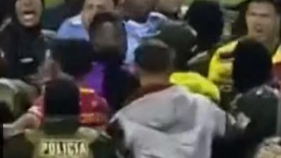 Lots of people grabbing and shouting at each other