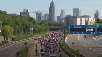 The demonstrators are calling for more environmentally friendly transport options.