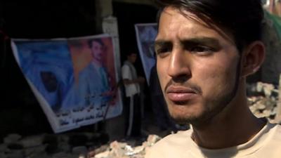 Afghan man, Assadullah Sultani, whose brothers died in an attack on their home