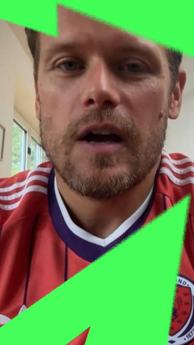 Sam Heughan looking at the camera