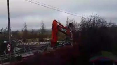 A West Calder resident complains to Network Rail that the work it is carrying out over his back garden wall is devastating his life.