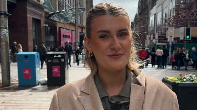 Woman looking at camera on Buchanan Street