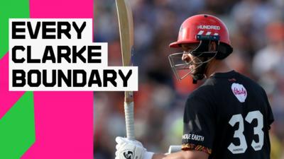 Joe Clarke holds his bat straight upwards