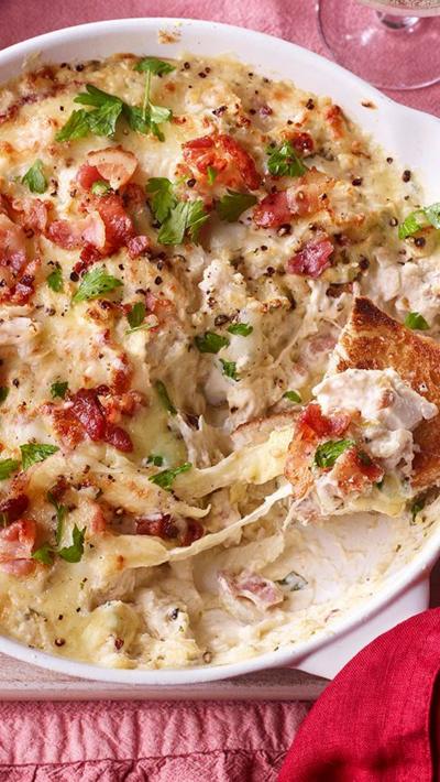 Baked chicken Caesar dip with cheese pull