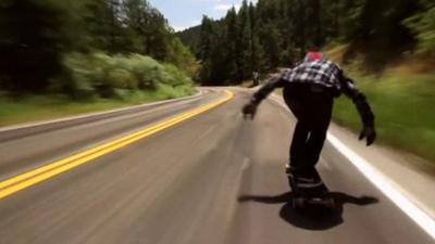 Zak Maytum on longboard