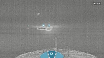 A thermal imaging camera clip captures an explosion after a collision of two ships