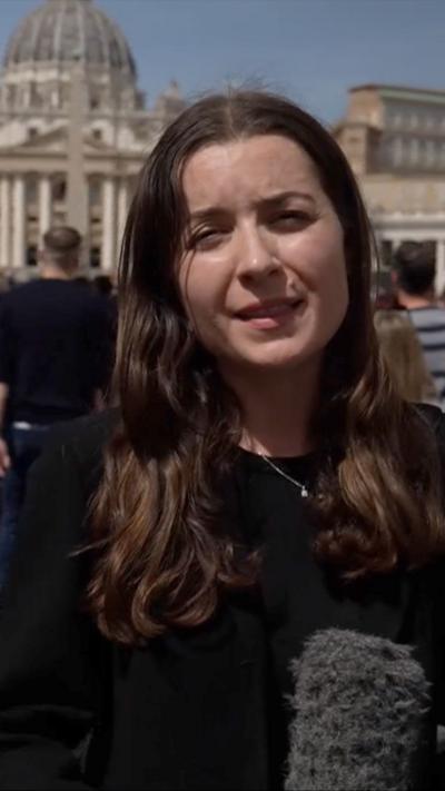 Sofia Bettiza stood at the Vatican holding microphone