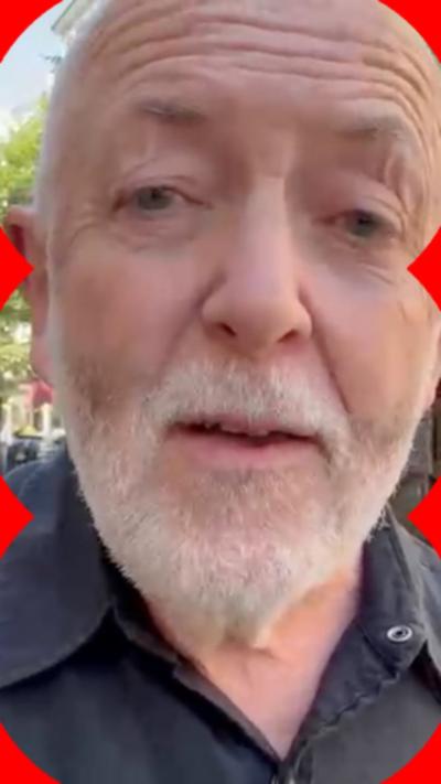 Bowen looks into the camera as he films himself selfie-style.