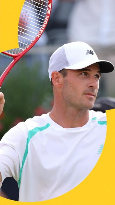 USA's Tommy Paul swings racket