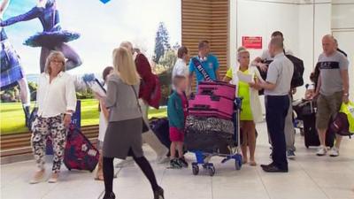 Tourists arrive in Glasgow airport