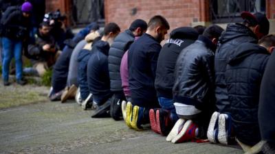 Salafist supporters praying in Germany - file pic