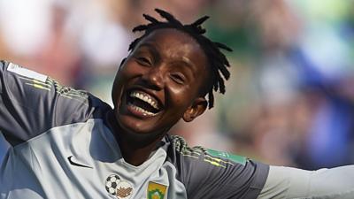 South Africa goalkeeper Andile Dlamini celebrating