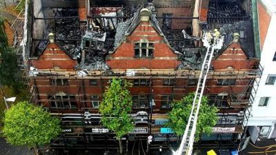 An aerial view of the damaged caused to the Old Cathedral Building by a fire