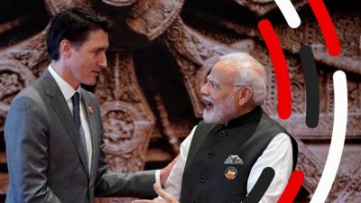 Justin Trudeau and Narendra Modi shaking hands