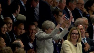 Theresa May attempts Mexican wave