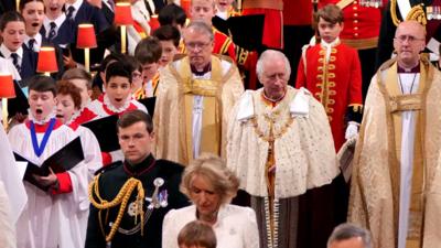 King Charles III arriving at Westminster Abbey