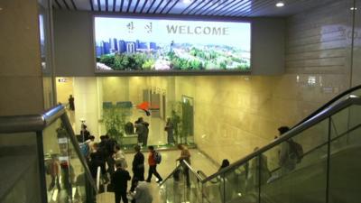 Arrival sign at Pyongyang airport, North Korea - April 2016