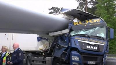 Turbine blade piercing side of lorry's cab