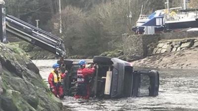 Car pulled from river