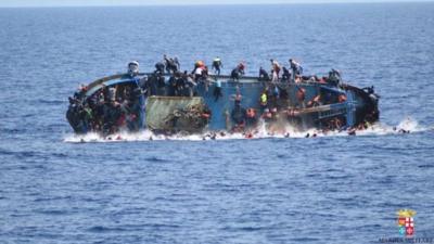 Italian rescuers pull survivors from the water