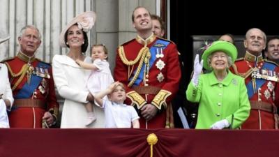 Camilla Duchess of Cornwall, Prince Charles, Catherine, Duchess of Cambridge holding Princess Charlotte, Prince George, Prince William, Queen Elizabeth, and Prince Philip on royal balcony