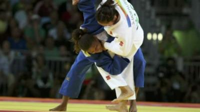 Judoka Silva in action with her Olympic opponent