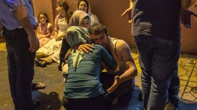 Relatives grieve at hospital August 20, 2016 in Gaziantep following a late night militant attack on a wedding party in southeastern Turkey - 21 August 2016