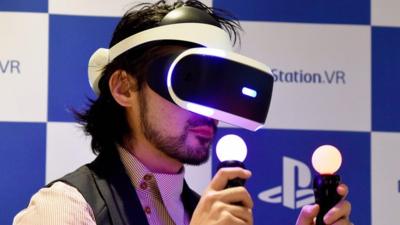 Gamer using Sony's PSVR virtual reality headset