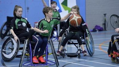 School children enjoy a game of wheelchair basketball at the Active Academy sessions in Belfast