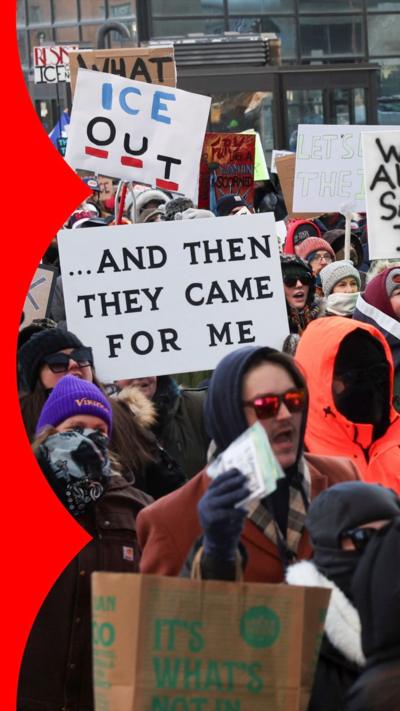 Protesters with signs in Minneapolis