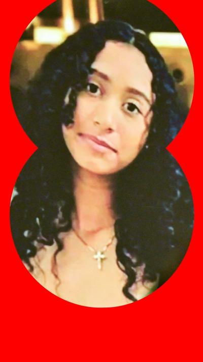 A portrait of the late Celeste Rivas Hernandez is shown during a press briefing by Los Angeles County District.