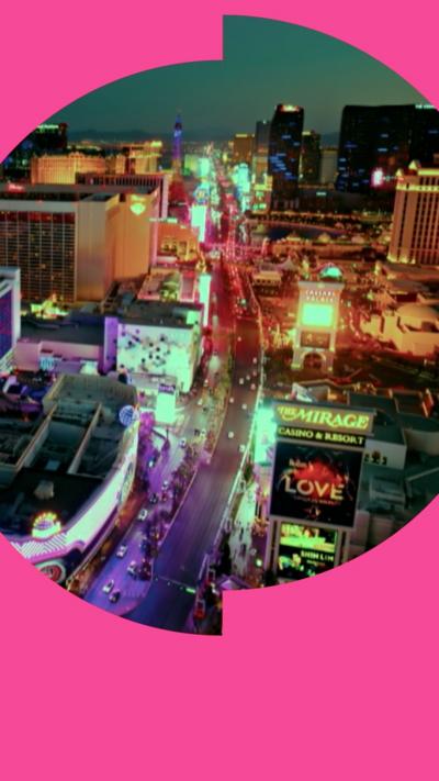 Top-down view of the Las Vegas strip, lit up by bright lights