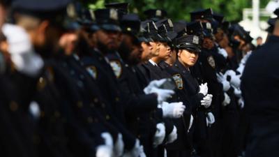 Police officers gather for the funeral services for New York City Police Department (NYPD) officer.