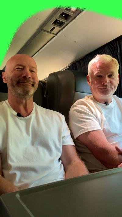 BBC commentary team Alan Shearer and Guy Mowbray on a train