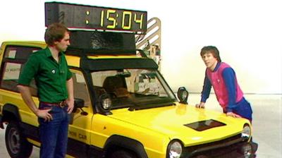Blue Peter presenters Simon Groom and Peter Duncan with a timing car which will be used in the London Marathon.