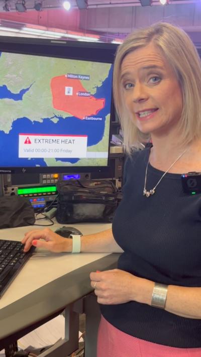 BBC Weather presenter Sarah Keith-Lucas next to computer screen showing extreme heat map