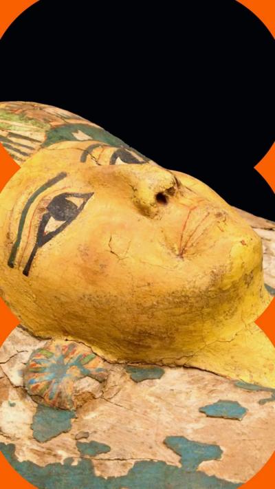 Ornately-painted mummy's coffin