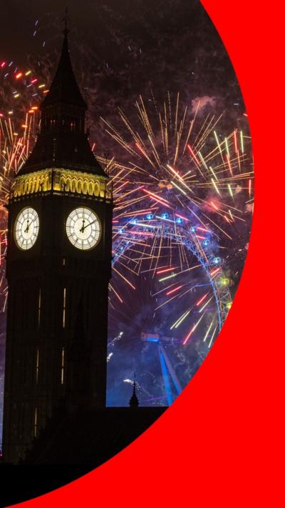 The Victoria Tower in Westminster with fireworks behind