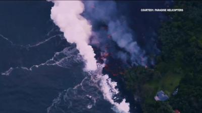 Lava flow meets the sea on Kilauea sending up plumes of toxic vog.