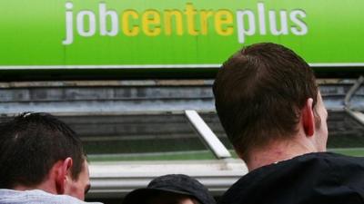 Men outside Job Centre