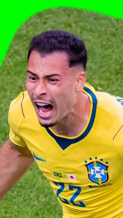 Gabriel Martinelli running in celebration after scoring a goal 