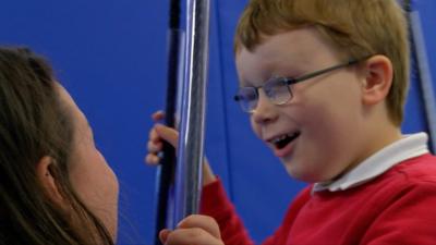 Zak enjoying the swing room